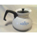 Awesome for your collection a never been used "Corning Ware" Kettle with Lid. In Excellent Condition