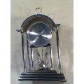A working "Recardo" mantel Clock with a Alarm Plus a Brass Carrage Clock & a Key ring set with Light
