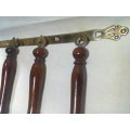 Heavy very ornate solid Brass with wooden Handles & Wall Hanger. Usable & in excellent condition.