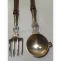Heavy very ornate solid Brass with wooden Handles & Wall Hanger. Usable & in excellent condition.