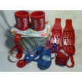 A Coca Cola Job Lot of Accessories in a cool bag.2 Ice Trays,2 Can Coolers,Carriers & a Can Hanger.
