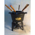 A Almost new never Used Cast Iron complete "Premier FONDUE set" Ready for U to set out at the party.