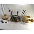 A Almost new/Used complete Enamel "FONDUE set" in Original Box. Ready for U to set out at the party.