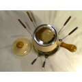 A Almost new/Used complete Enamel "FONDUE set" in Original Box. Ready for U to set out at the party.