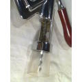 A Vintage Chrome Wine cork bottle screw opener Table mount,extracts very fast smooth easy operation