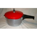 A Vintage "Tedelex" Pressure cooker with receipt book & 3 smaller pot's & defuse plate & regulator