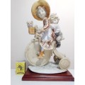 WoW. A Vintage F.E.J. Collector`s Edition Porcelain. A Girl with small Boy, Cat on a Tricycle.