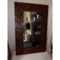 Bargain an impressive wall mirror . Hand beaten ornate copper wall mirror, 4 Angels on the corners .