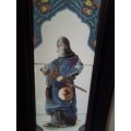 A rare `Man of War` 3 tile plaque from Algeria mounted in a Old solid wooden frame.