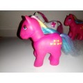 3 x My Little Ponys 2 Dark Pink and a White Butterfly pony`s Stamped `Simba-Toys.