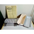 4 x Baking Items. Enamel Bread pans, RAVIOLI Chef pan with instructions, Expandable cooling Rack.