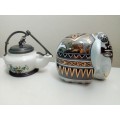 A True Shi Lankin Memento The Elephant sealed pack.The Art of Tea. Plus a Porcelain Kettle/Oil lamp.