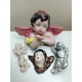 A nice lot of 4 Cherups. Perfect for presenting a Christian atmosphere at Christmas time.