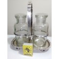 A four footed Stamped `L&WS` EP 4764 Condiments set with 2 glass container`s