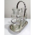 A four footed Stamped `L&WS` EP 4764 Condiments set with 2 glass container`s