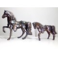 Two Vintage Bronze Spelter prize Horses. A pair of western style bronze horses, great copper platina