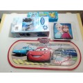 3 puzzles and a Sponge Bob pencil box. 3D Frozen puzzle + a block one and a `World of Car`s` puzzle