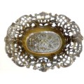 A Vintage Bronze trinket dish with filigree and a stamp ` Mod dep made in Italy `