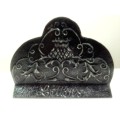A Vintage Pewter facade on a galvanized plate base Letter holder.