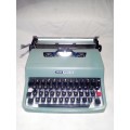 Olivetti Manual Traveling Typewriter in Original Case WORKING CONDITION.