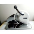 Vintage stainless steel Pineware  bread/meat slicer with fair wear and tare. For that Retro Kitchen.