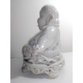 Antique Large and Heavy 4.5Kg`s laughing Buddha cast in crushed marble stone and Resin mixture.