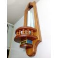 A Origan pine mirrored wall shelf to use as a Candle holder with Matches slot or figurine.