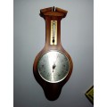 A working Vintage ` Talyor` Banjo Berometer made in England. Size: 280mm Tall.