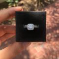 The S925 Silver 1.25 Ct. Clear CZ Cushion Cut Engagement Ring + 1 Wedding Band