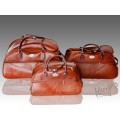SET OF 3 LEATHER TRAVEL LUGGAGE BAGS, WITH UNIVERSAL WHEELS AND PULLING HANDLE