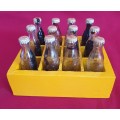 12 x vintage miniature Coca-Cola bottles in crate