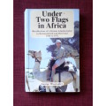 Under Two Flags in Africa by George Winstanley. S/C. 254 pp. 1st 2000