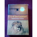 Cry of the Kalahari by Mark and Delia Owens. 1st ed 1985. Signed. H/C with jacket. 341 pp.