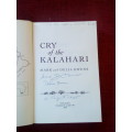 Cry of the Kalahari by Mark and Delia Owens. 1st ed 1985. Signed. H/C with jacket. 341 pp.
