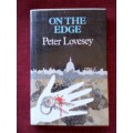 On the Edge by Peter Lovesey. 1st 1989. H/C with jacket. Large print. 321 pp.