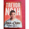 Born a Crime and Other Stories, by Trevor Noah. 2017 reprint. Softcover. 342 pp.