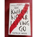 The Knife of Never Letting Go by Patrick Ness. First edition 2008. Softcover. 479 pp.
