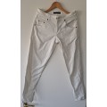 White Calvin Klein Jeans size 28 small with working zips, small zip on each leg condition is good