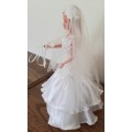 Floral Tulip wedding dress with long bodice on Barbie