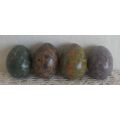 COLLECTION OF FOUR STONE EGGS