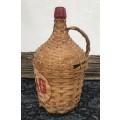 GLASS WICKER WRAPPED DEMIJOHN with Label