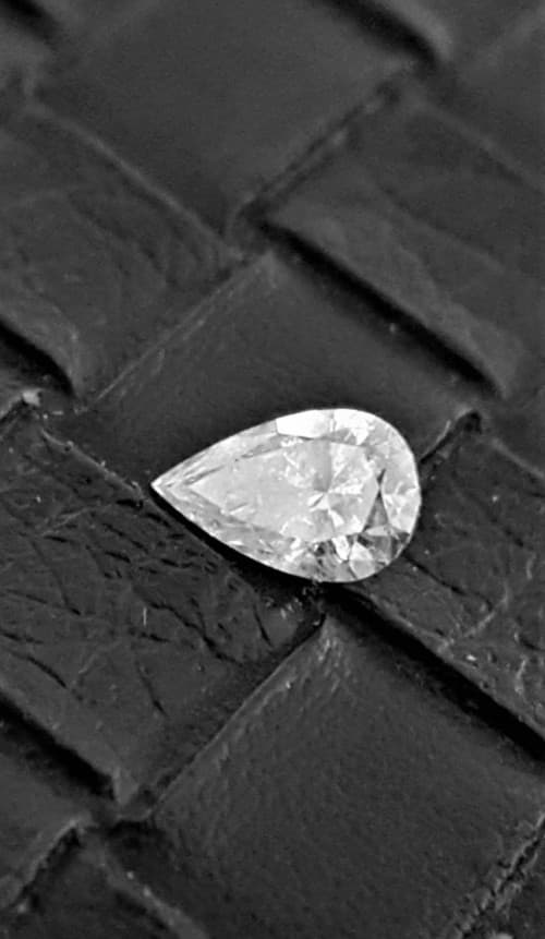 Certified 0.71Cts Fancy White Diamond Pear Shaped