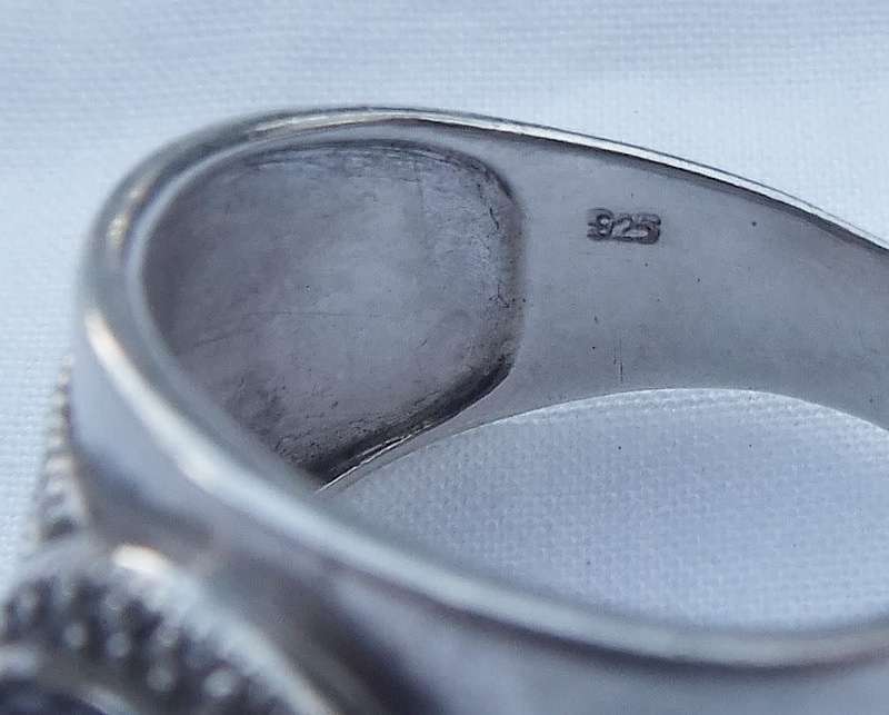 Rings - A STUNNING SOLID STERLING SILVER RING WITH A FACETED BLUE AND ...