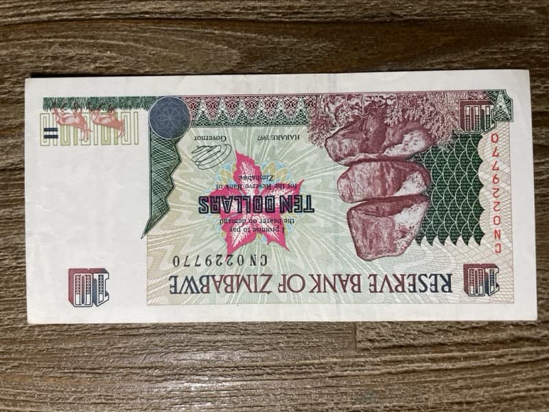 Zimbabwe   *  $10  *  issued 1997  *  au note not unc