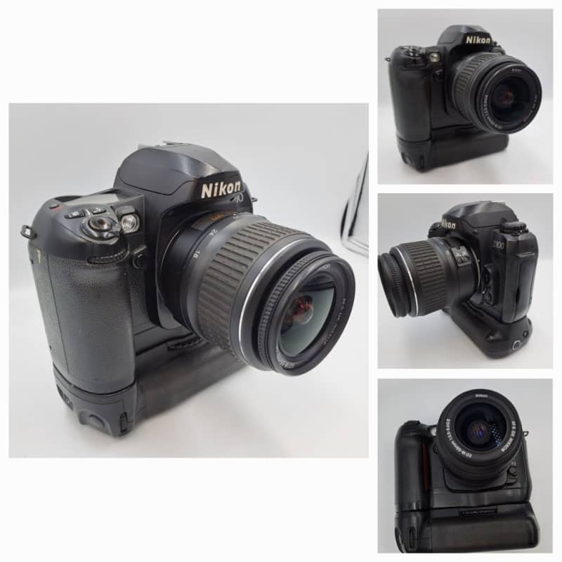 2002 Nikon D100 DSLR Camera with Nikon AF-S DX Nikkor ED 18-55mm Lens and Multi Func. Battery Pack