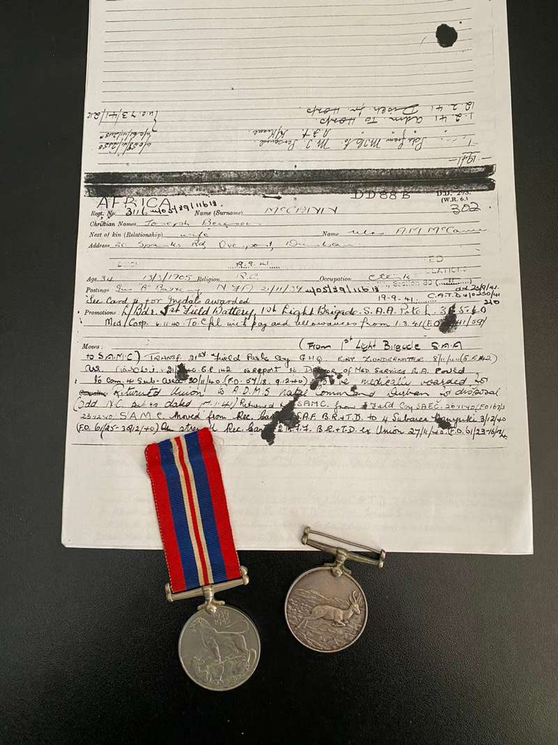 World War 2 WAR MEDAL 193945AFRICA SERVICE MEDAL 3116 J.B. MC CANN