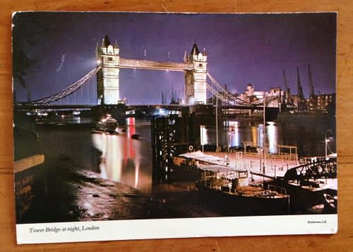 POSTCARD POST CARD UNITED KINGDOM LONDON TOWER BRIDGE at night BARGE BOAT RIVER BUILDINGS CITY.