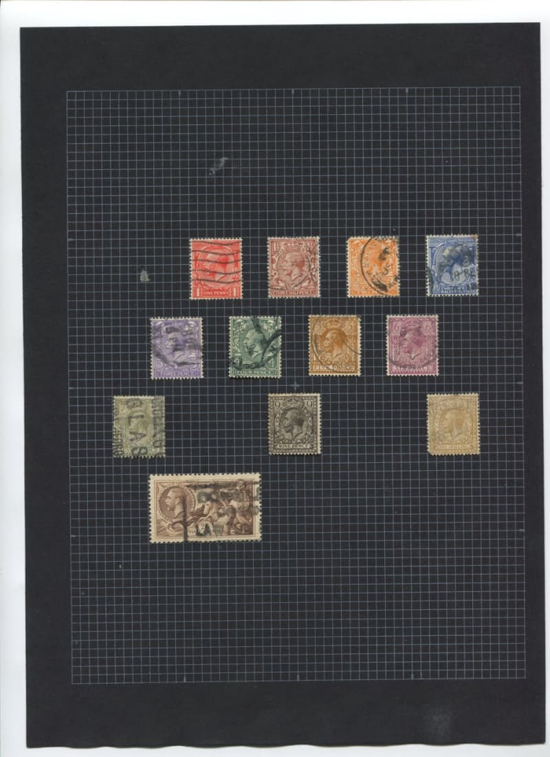 Great Britain - 12 Stamps Mounted on Old Album Page