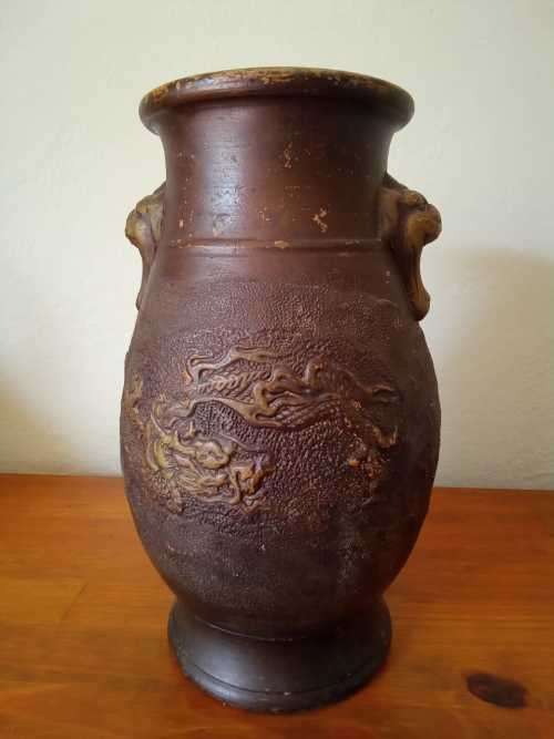 Oriental Antique Chinese Terracotta Dragon Vase 25cm tall was sold