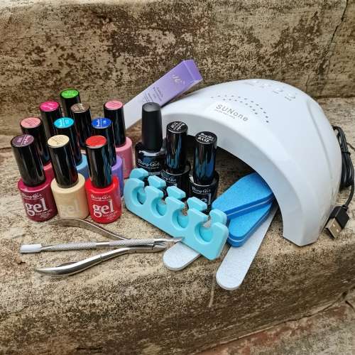 Nails FULLY LOADED GEL NAIL KIT 48w SUNone UV LED LAMP was sold for